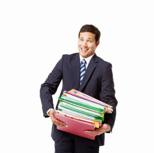 a worker holding many file folders