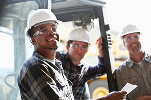 workers operating a forklift