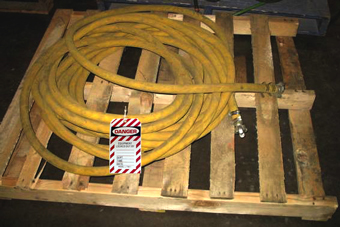 compressed air hose that has been tagged out of service