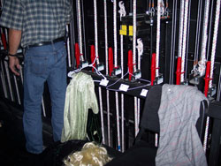 costumes on hangers hung on the rigging