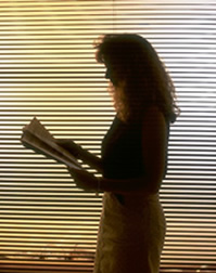 a woman at work reading 