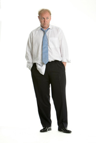 a man wearing rumbled unkept business suit.